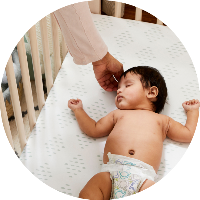 Baby sleeping in crib